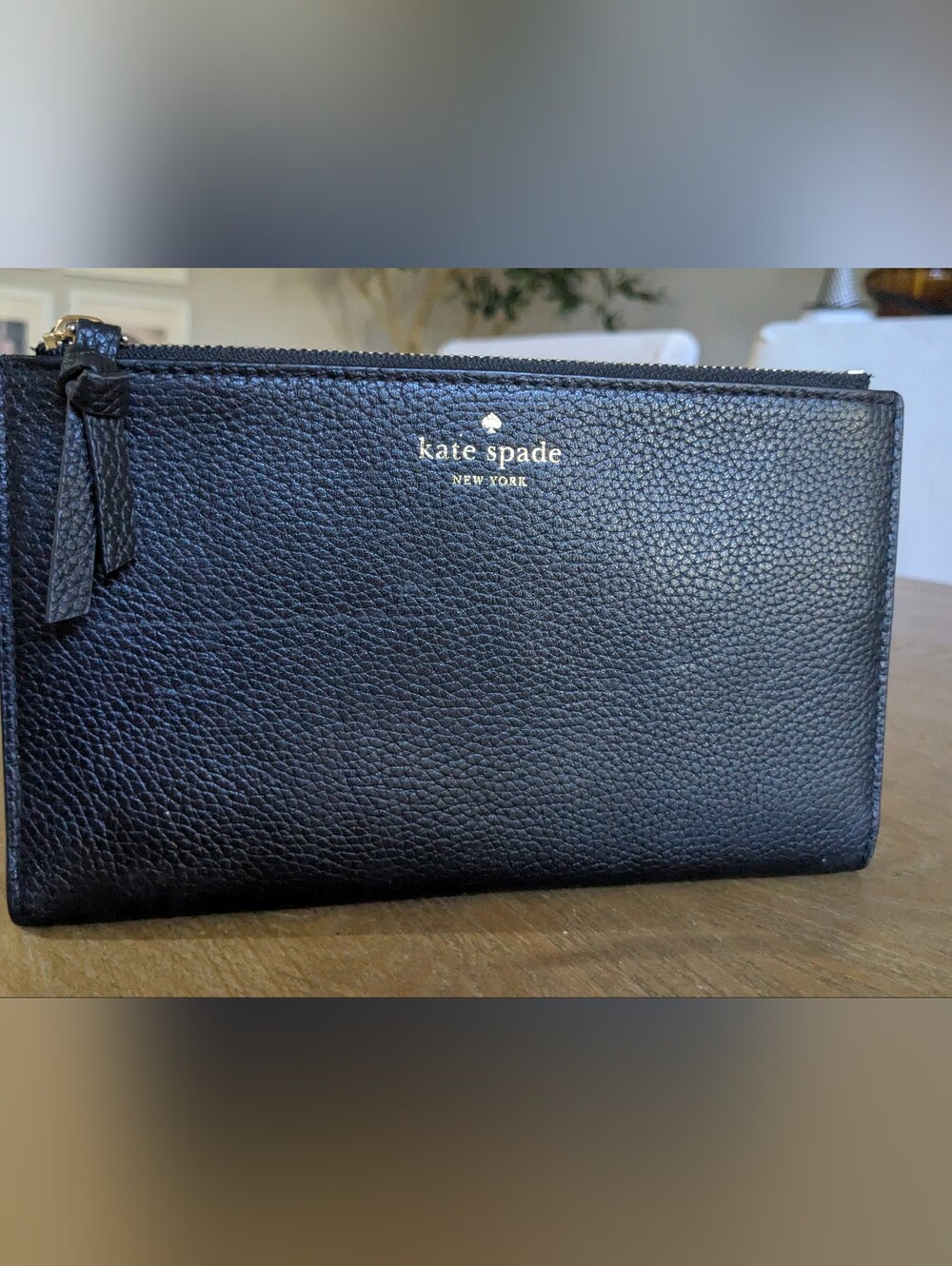 black Kate Spade Mulberry Street Small Malea leather wallet with a gold-tone zip
